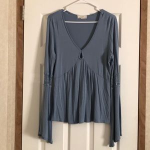 Long sleeve light blue bell sleeve top